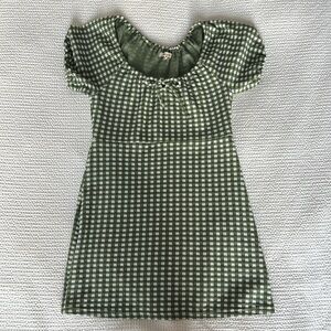 Madewell mini dress in green gingham pattern.